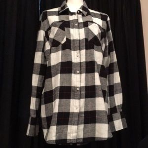 Black and white plaid button down top.